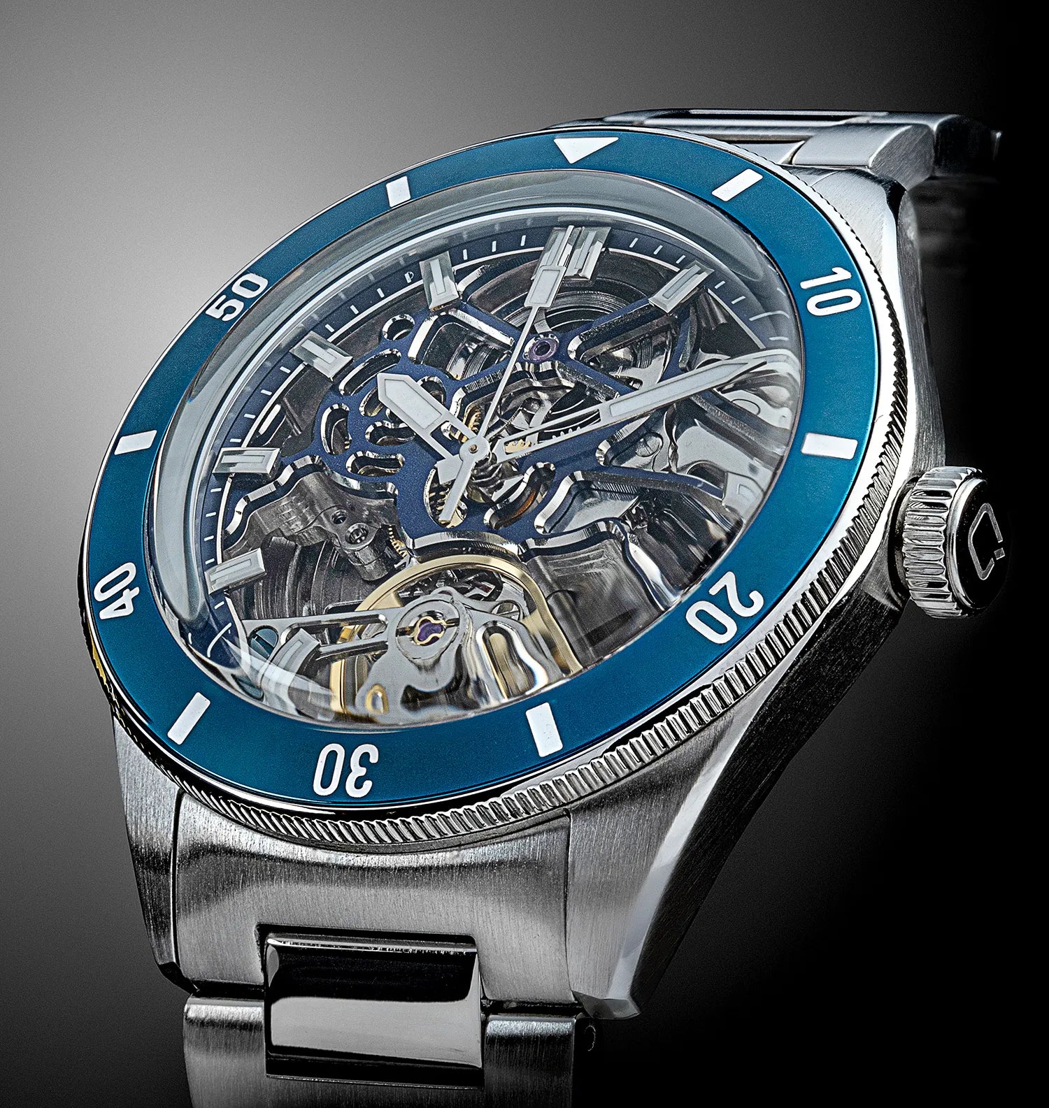 Qorum Equinox Men’s Automatic Skeleton Watch – Steel Finish Dial, Blue Bezel, Stainless Steel Strap